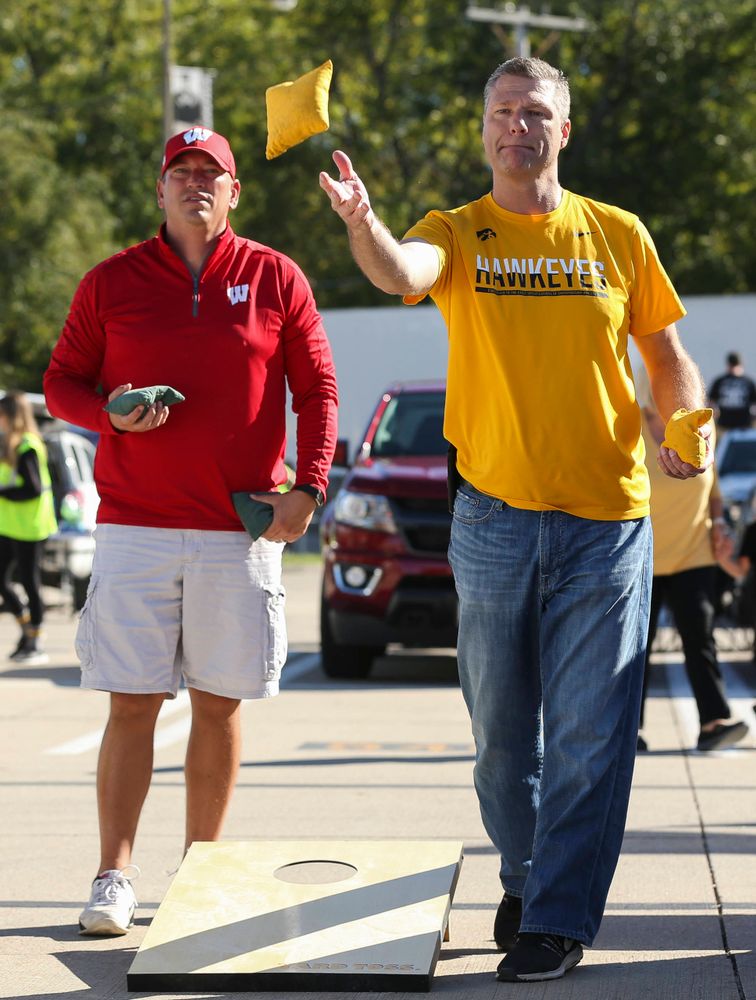 Fans play a game of corn hole outside of Kinnick Stadium before a game against Wisconsin on September 22, 2018.