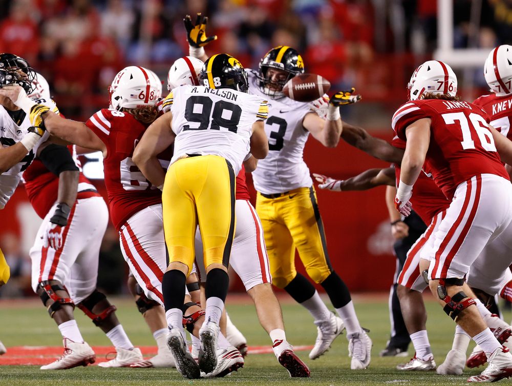 Iowa Hawkeyes defensive end Anthony Nelson (98) and linebacker Josey Jewell (43) 