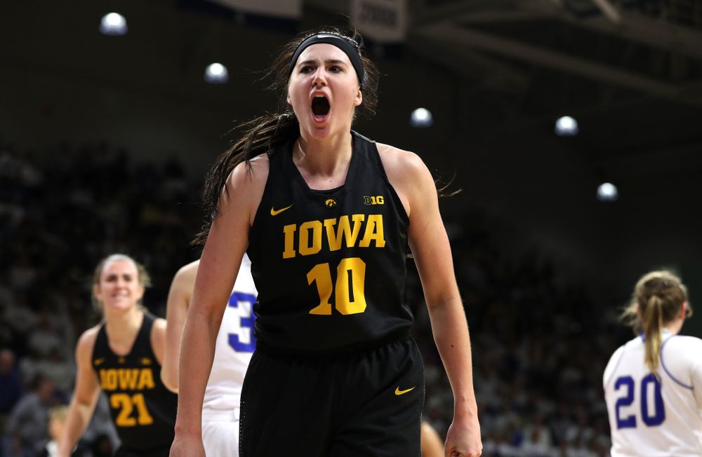 Iowa Hawkeyes forward Megan Gustafson (10) reacts after an and one against the Drake Bulldogs Friday, December 21, 2018 at the Knapp Center in Des Moines. (Brian Ray/hawkeyesports.com)