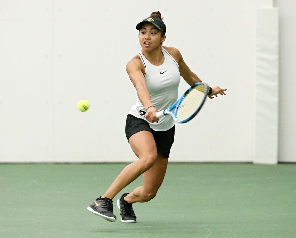 Iowa’s Michelle Bacalla returns a shot during her singles match at the Hawkeye Tennis and Recreation Complex in Iowa City on Sunday, February 16, 2020. (Stephen Mally/hawkeyesports.com)