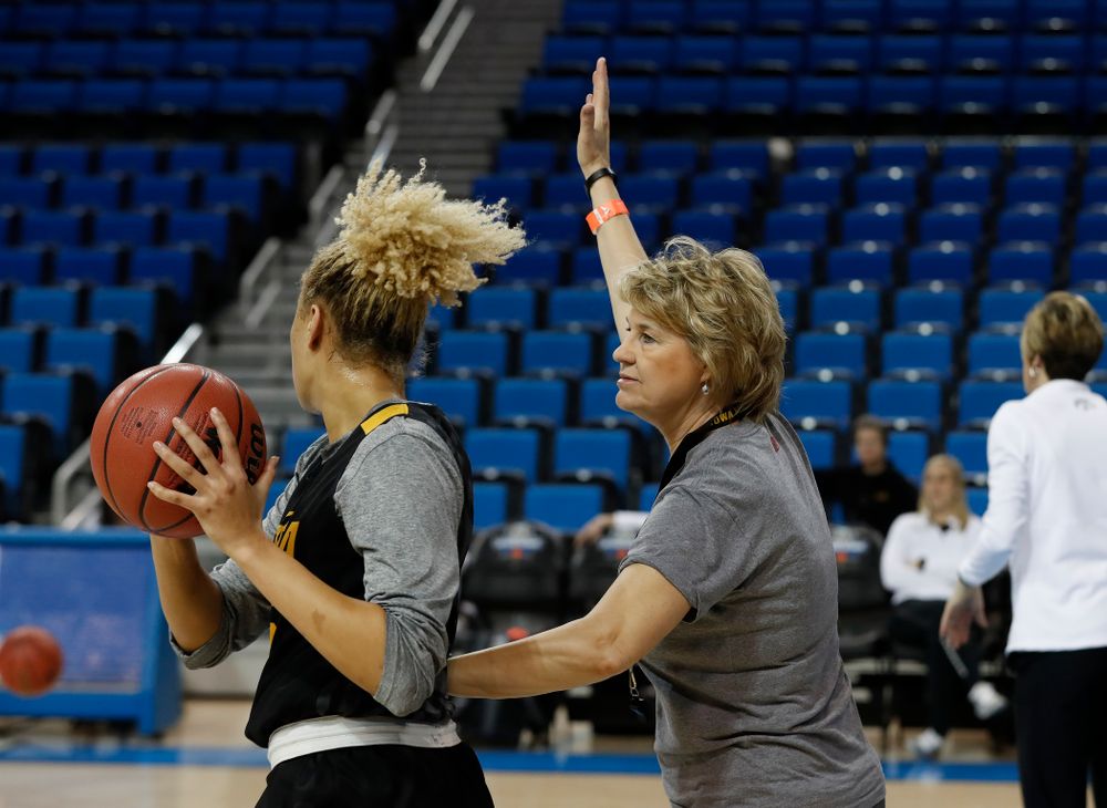 Iowa Hawkeyes forward Chase Coley (4) works against head coach Lisa Bluder during practice Friday, March 16, 2018 at Pauley Pavilion on the campus of UCLA. (Brian Ray/hawkeyesports.com)