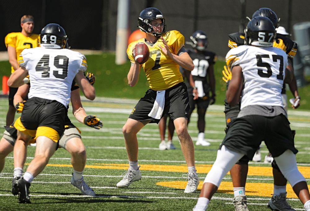 Iowa Hawkeyes quarterback Spencer Petras (7) drops back to pass during Fall Camp Practice No. 7 at the Hansen Football Performance Center in Iowa City on Friday, Aug 9, 2019. (Stephen Mally/hawkeyesports.com)