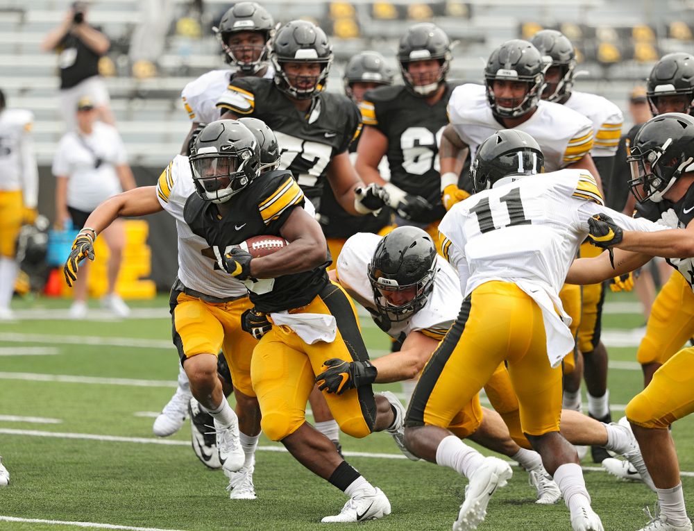 Iowa Hawkeyes running back Mekhi Sargent (10) on a run during Fall Camp Practice No. 8 at Kids Day at Kinnick Stadium in Iowa City on Saturday, Aug 10, 2019. (Stephen Mally/hawkeyesports.com)
