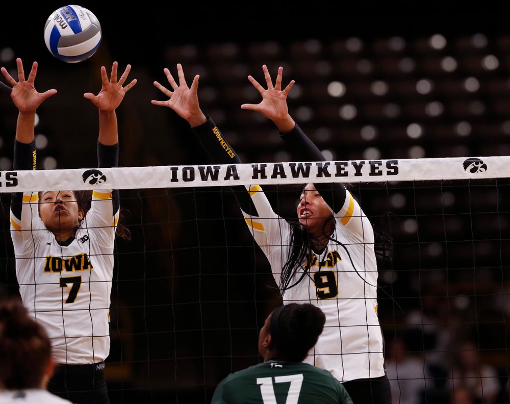 Iowa Hawkeyes setter Gabrielle Orr (7) and middle blocker Amiya Jones (9) against the Michigan State Spartans Friday, September 21, 2018 at Carver-Hawkeye Arena. (Brian Ray/hawkeyesports.com)