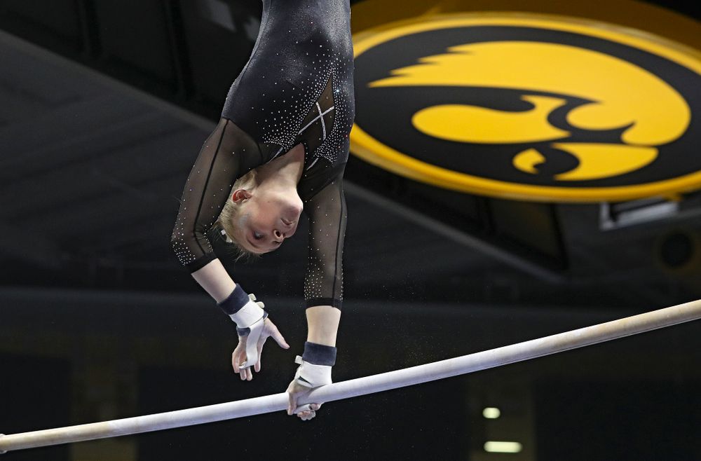 Iowa’s Allyson Steffensmeier competes on the bars during their meet at Carver-Hawkeye Arena in Iowa City on Sunday, March 8, 2020. (Stephen Mally/hawkeyesports.com)