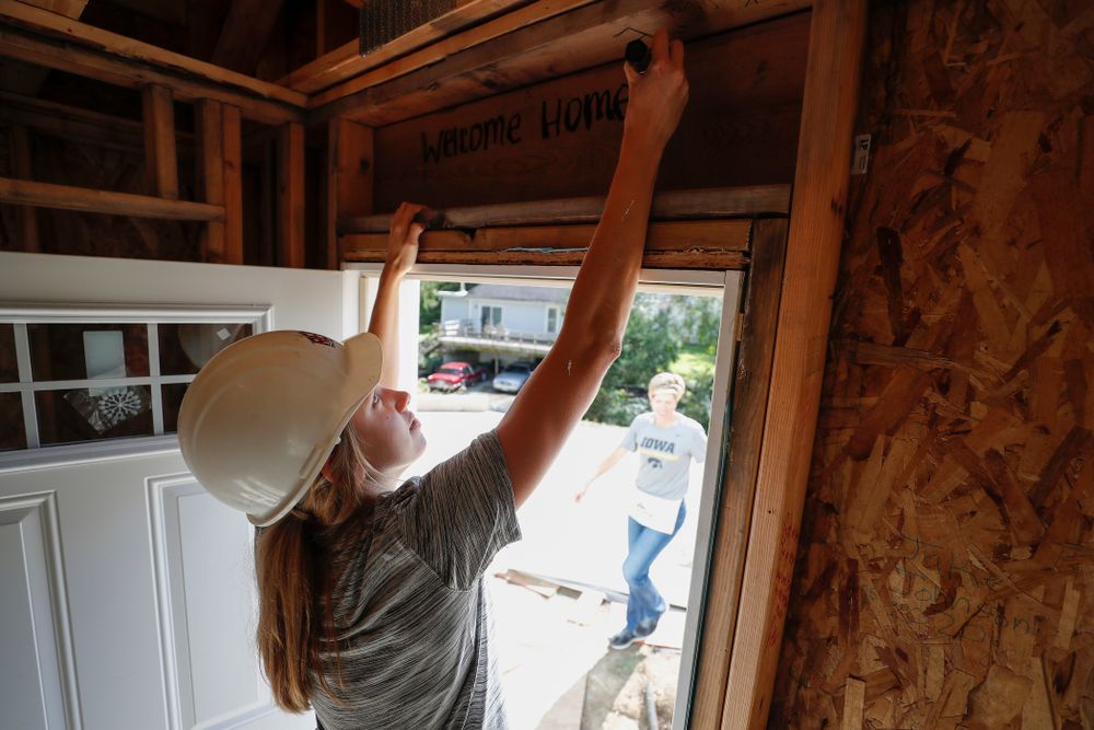 Iowa Hawkeyes forward Logan Cook (23) works on the Habitat for Humanity Women's Build Wednesday, September 26, 2018 in Iowa City. (Brian Ray/hawkeyesports.com)
