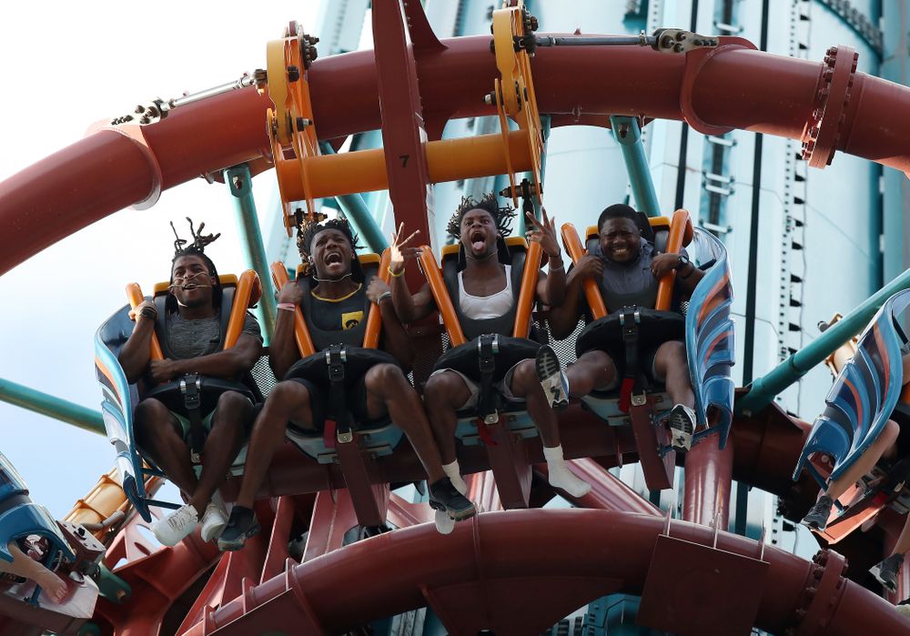 Iowa Hawkeyes defensive back Devonte Young (17), wide receiver Brandon Smith (12), wide receiver Ihmir Smith-Marsette (6), and and running backs coach Derrick Foster ride Falcon's Fury during an Outback Bowl team event Saturday, December 29, 2018 at Busch Gardens in Tampa, FL. (Brian Ray/hawkeyesports.com)