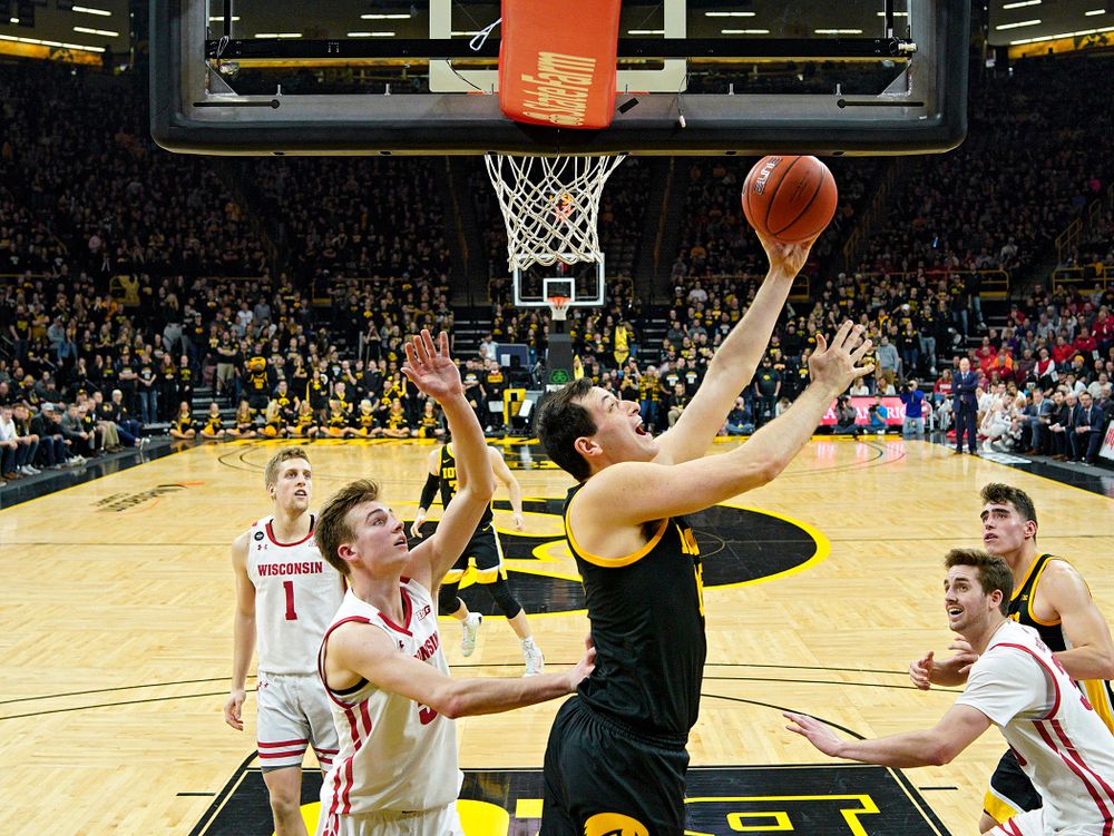 Iowa Hawkeyes forward Ryan Kriener (15) puts up a shot during the second half of their game at Carver-Hawkeye Arena in Iowa City on Monday, January 27, 2020. (Stephen Mally/hawkeyesports.com)