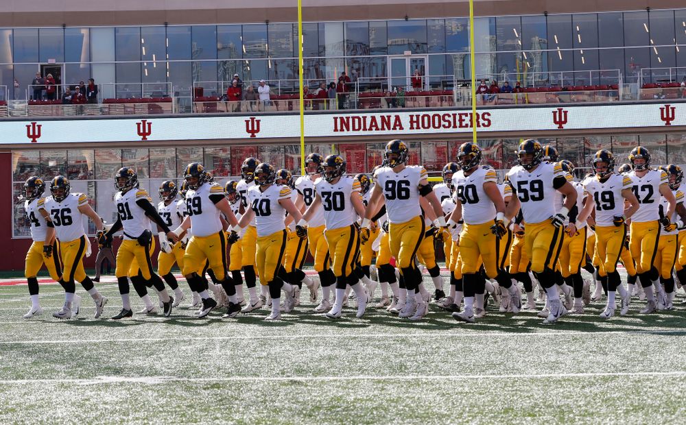 The Iowa Hawkeyes swarm out for their game against the Indiana Hoosiers Saturday, October 13, 2018 at Memorial Stadium, in Bloomington, Ind. (Max Allen/hawkeyesports.com)