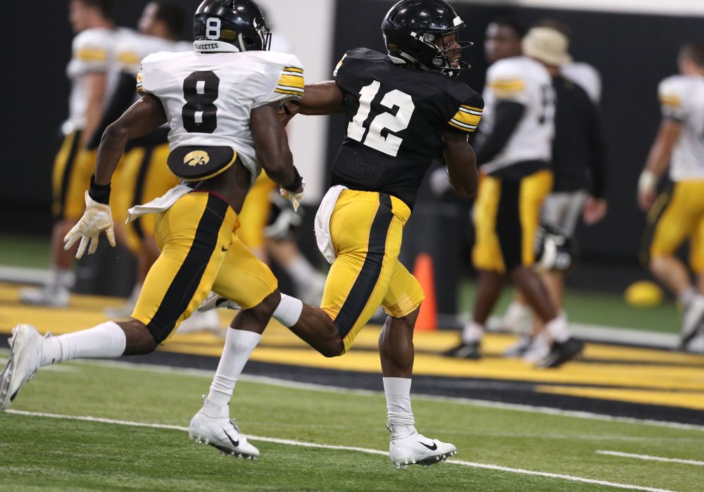 Iowa Hawkeyes wide receiver Brandon Smith (12) during Fall Camp Practice No. 6 Thursday, August 8, 2019 at the Ronald D. and Margaret L. Kenyon Football Practice Facility. (Brian Ray/hawkeyesports.com)