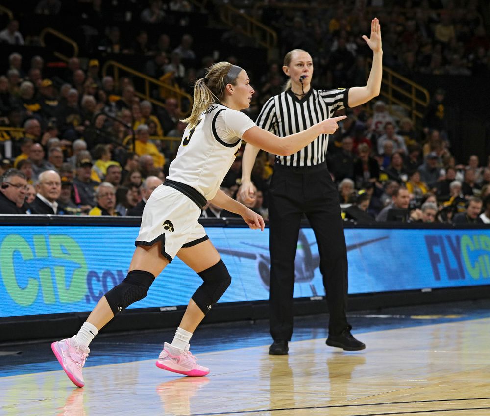 Iowa Hawkeyes guard Makenzie Meyer (3) points after making a 3-pointer during the second quarter of their game at Carver-Hawkeye Arena in Iowa City on Sunday, January 26, 2020. (Stephen Mally/hawkeyesports.com)