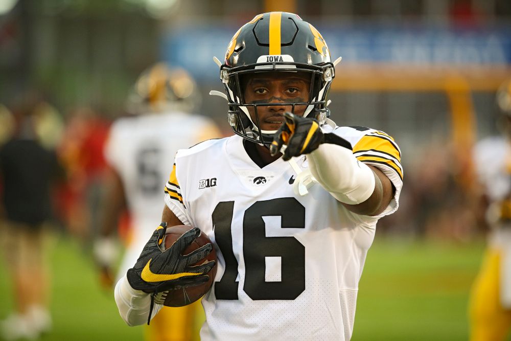 Iowa Hawkeyes wide receiver Charlie Jones (16) warms up with his teammates before their Iowa Corn Cy-Hawk Series game at Jack Trice Stadium in Ames on Saturday, Sep 14, 2019. (Stephen Mally/hawkeyesports.com)