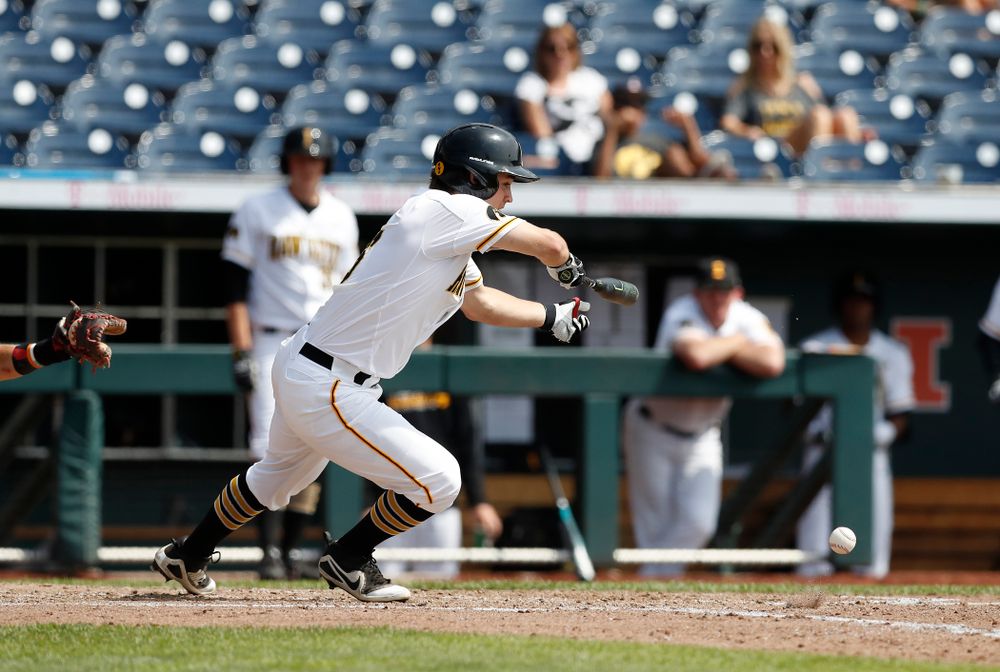 Iowa Hawkeyes outfielder Justin Jenkins (6) puts down a bunt for a single against the Ohio State Buckeyes in the second round of the Big Ten Baseball Tournament  Thursday, May 24, 2018 at TD Ameritrade Park in Omaha, Neb. (Brian Ray/hawkeyesports.com) 