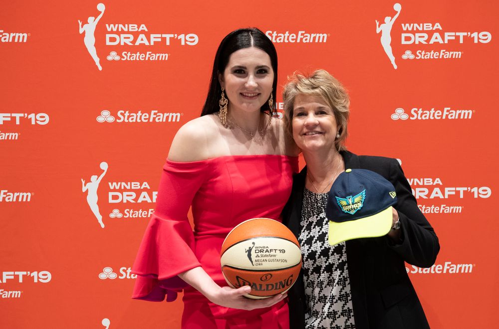 Iowa Hawkeyes forward Megan Gustafson (10) with head coach Lisa Bluder after being selected by the Dallas Wings in the second round of the 2019 WNBA Draft Wednesday, April 10, 2019 at Nike New York Headquarters in New York City. (Brian Ray/hawkeyesports.com)