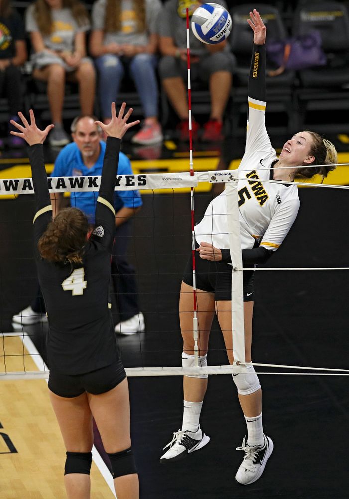 Iowa’s Meghan Buzzerio (5) goes up for a kill during the first set of their Big Ten/Pac-12 Challenge match against Colorado at Carver-Hawkeye Arena in Iowa City on Friday, Sep 6, 2019. (Stephen Mally/hawkeyesports.com)