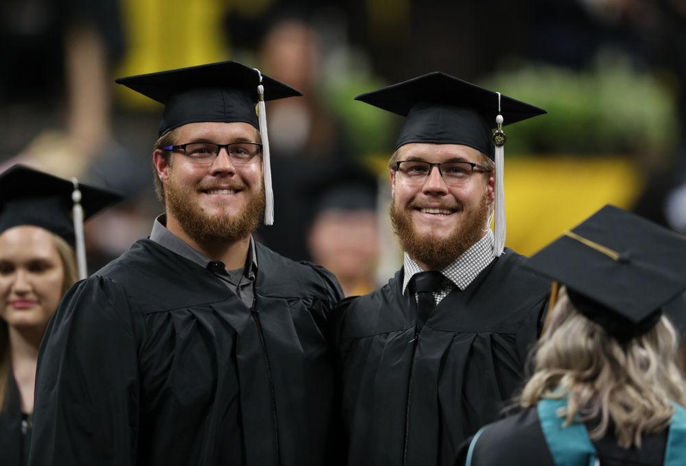 Hawkeye FootballÕs Landan and Levi Paulsen during the College of Liberal Arts and Sciences spring commencement Saturday, May 11, 2019 at Carver-Hawkeye Arena. (Brian Ray/hawkeyesports.com)