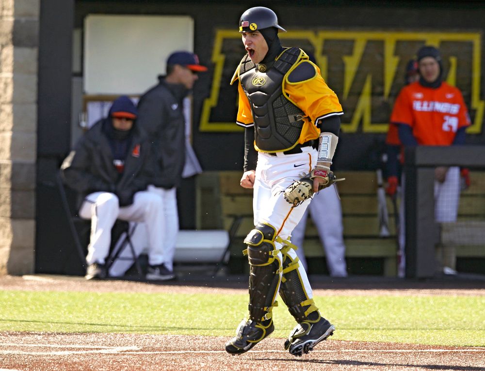 Iowa Hawkeyes catcher Austin Martin (34) is pumped up after completing an inning ending double play during the eighth inning against Illinois at Duane Banks Field in Iowa City on Sunday, Mar. 31, 2019. (Stephen Mally/hawkeyesports.com)