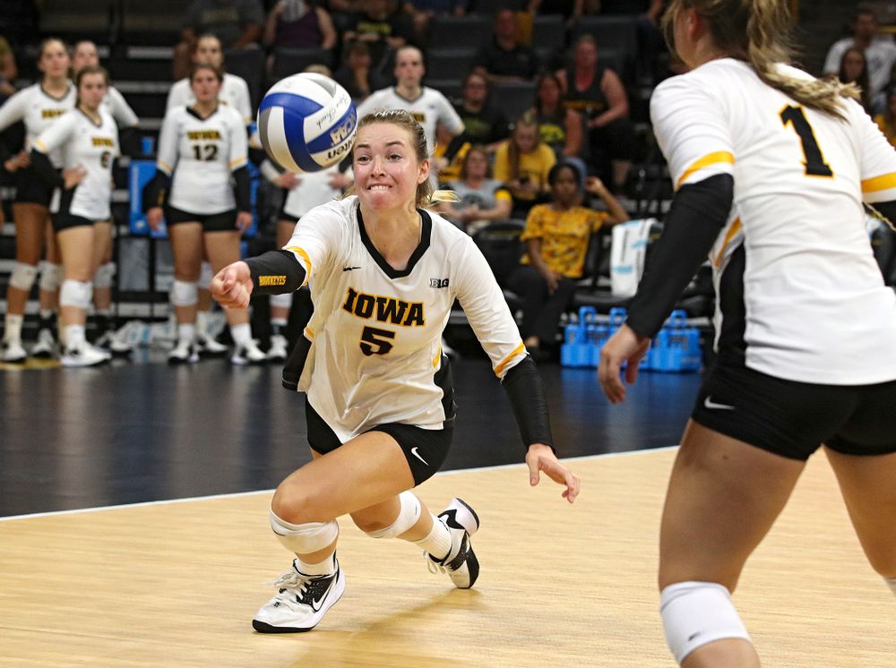 Iowa’s Meghan Buzzerio (5) eyes the ball as Joslyn Boyer (1) looks on during their Big Ten/Pac-12 Challenge match at Carver-Hawkeye Arena in Iowa City on Saturday, Sep 7, 2019. (Stephen Mally/hawkeyesports.com)