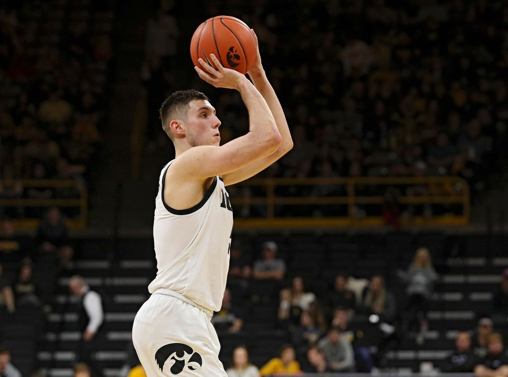 Iowa Hawkeyes guard CJ Fredrick (5) makes a 3-pointer during the second half of their game at Carver-Hawkeye Arena in Iowa City on Sunday, Nov 24, 2019. (Stephen Mally/hawkeyesports.com)