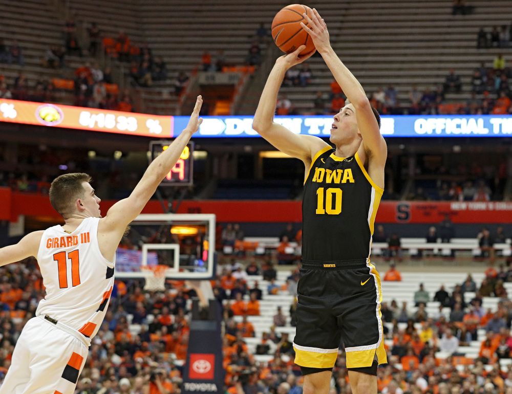 Iowa Hawkeyes guard Joe Wieskamp (10) puts up a shot during the first half of their ACC/Big Ten Challenge game at the Carrier Dome in Syracuse, N.Y. on Tuesday, Dec 3, 2019. (Stephen Mally/hawkeyesports.com)