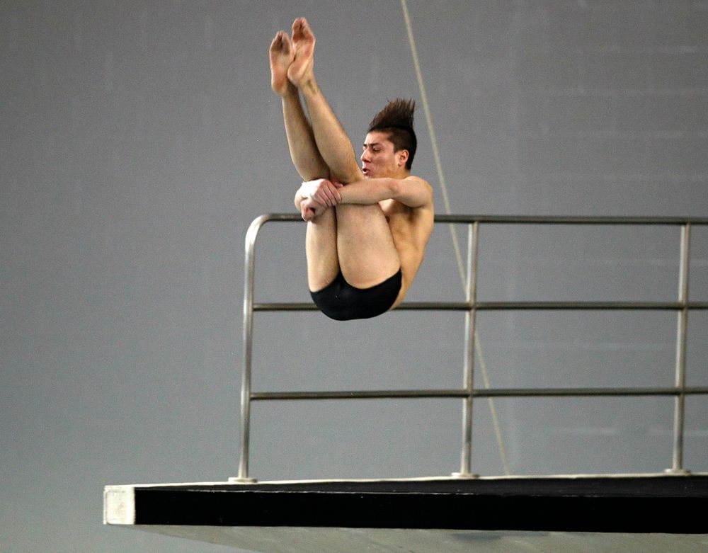 Iowa’s Jonatan Posligua competes in the platform diving event during their meet at the Campus Recreation and Wellness Center in Iowa City on Friday, February 7, 2020. (Stephen Mally/hawkeyesports.com)