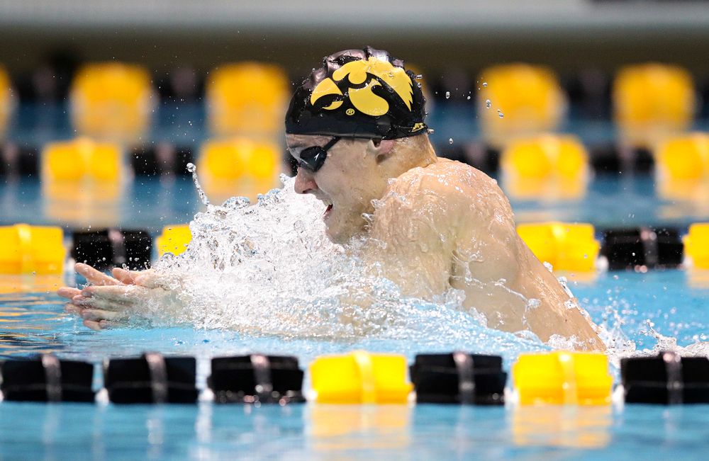 Iowa’s Daniel Swanepoel swims the breaststroke section in the men’s 400 yard medley relay event during their meet at the Campus Recreation and Wellness Center in Iowa City on Friday, February 7, 2020. (Stephen Mally/hawkeyesports.com)