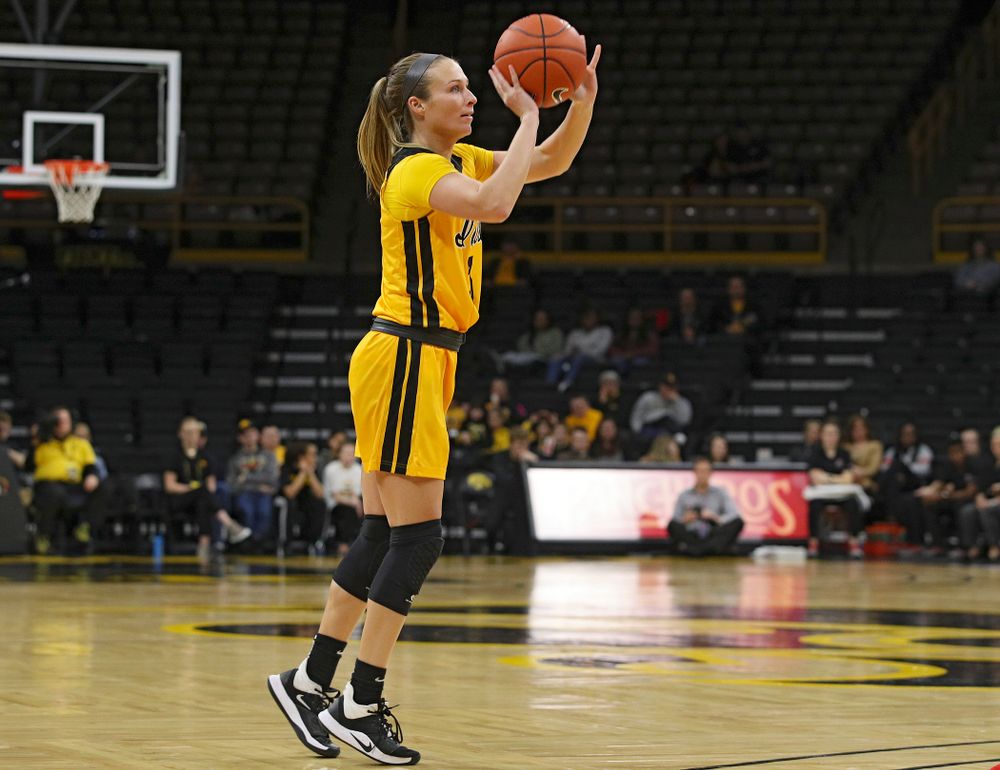 Iowa Hawkeyes guard Makenzie Meyer (3) makes a 3-pointer during the third quarter of their game at Carver-Hawkeye Arena in Iowa City on Thursday, January 23, 2020. (Stephen Mally/hawkeyesports.com)