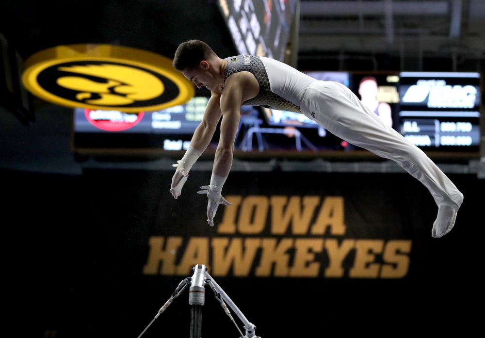 Iowa’s Mitch Mandozzi competes on the high bar against Illinois Sunday, March 1, 2020 at Carver-Hawkeye Arena. (Brian Ray/hawkeyesports.com)