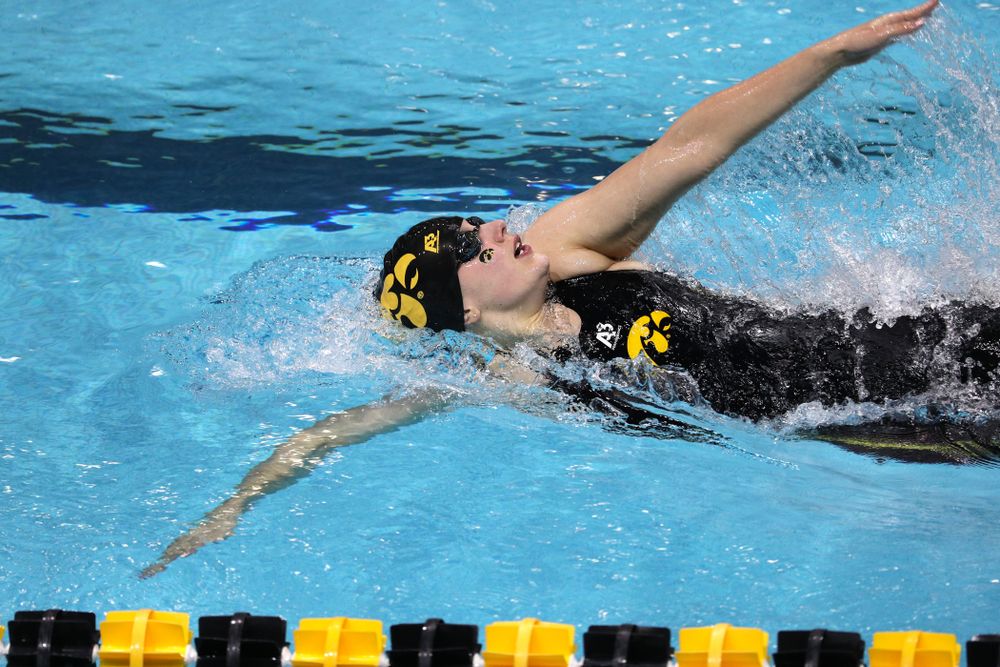 Iowa's Hannah Burvill swims the 100-yard backstroke against the Iowa State Cyclones in the Iowa Corn Cy-Hawk Series Friday, December 7, 2018 at at the Campus Recreation and Wellness Center. (Brian Ray/hawkeyesports.com)