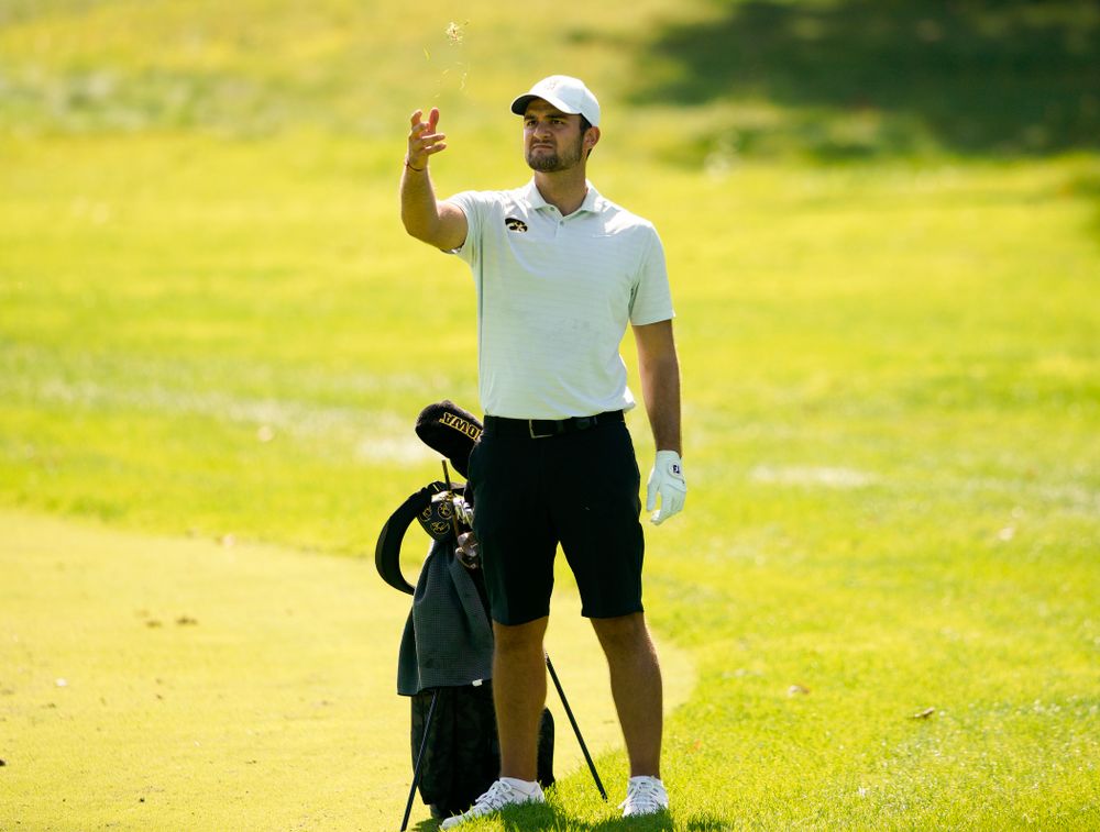 Iowa’s Gonzalo Leal throws gas in the wind as he checks the wind during the second day of the Golfweek Conference Challenge at the Cedar Rapids Country Club in Cedar Rapids on Monday, Sep 16, 2019. (Stephen Mally/hawkeyesports.com)