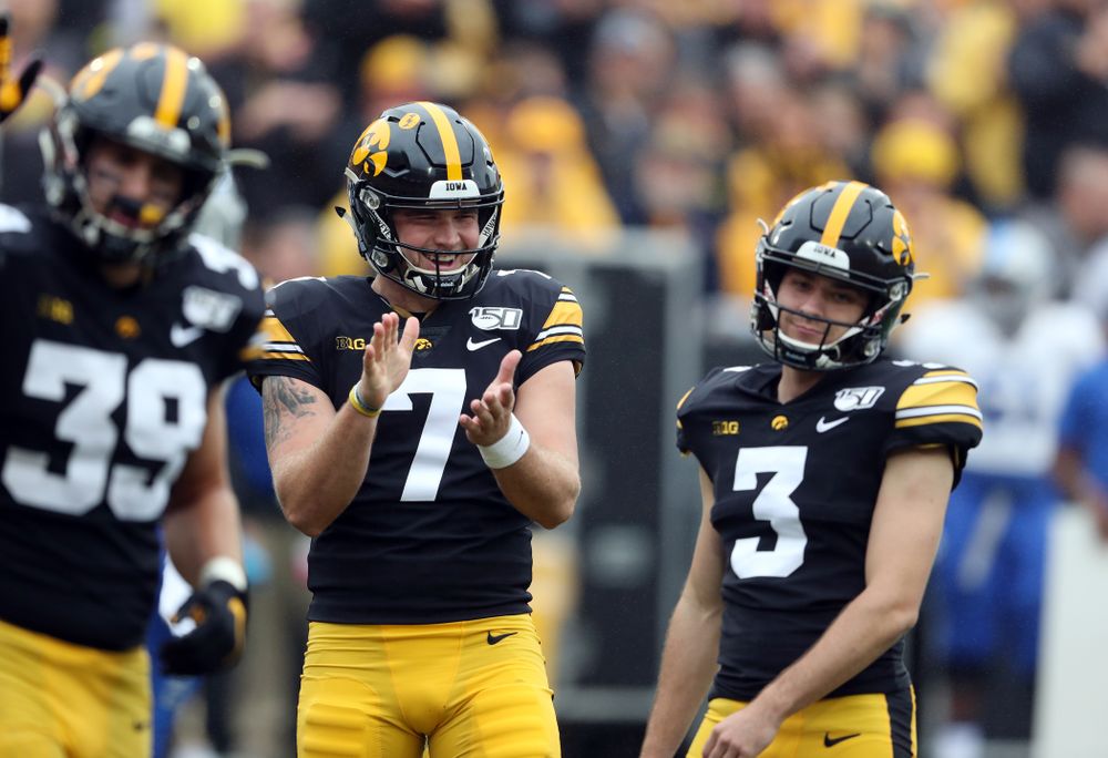 Iowa Hawkeyes punter Colten Rastetter (7) reacts after beating place kicker Keith Duncan (3) at rock paper scissors following a kick against Middle Tennessee State Saturday, September 28, 2019 at Kinnick Stadium. (Brian Ray/hawkeyesports.com)
