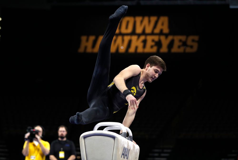 Kevin Johnson competes on the pommel horse against Illinois 