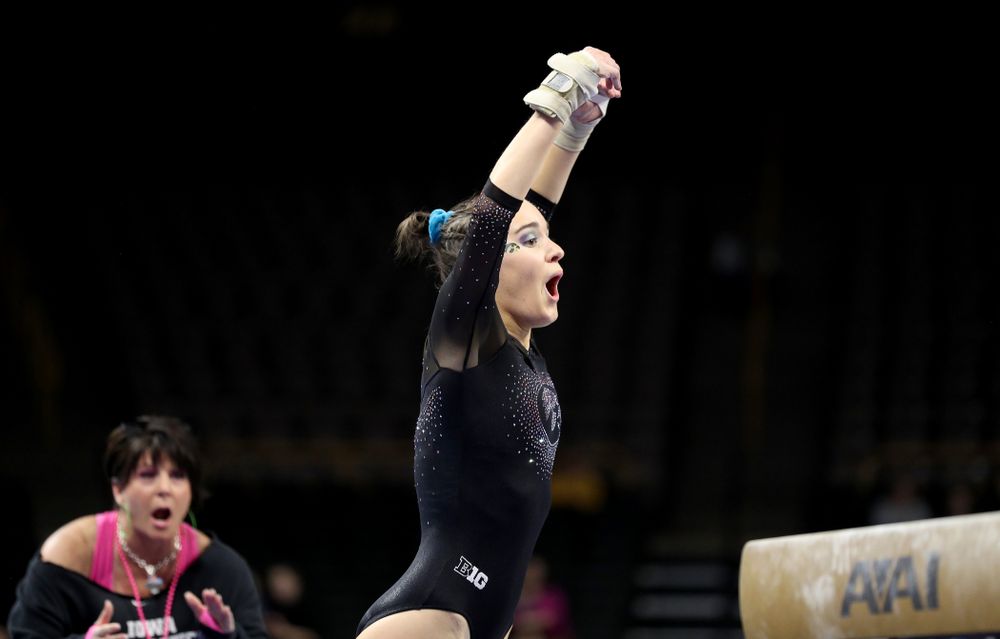 Iowa’s Allie Gilchrist competes on the beam against Michigan Friday, February 14, 2020 at Carver-Hawkeye Arena. (Brian Ray/hawkeyesports.com)