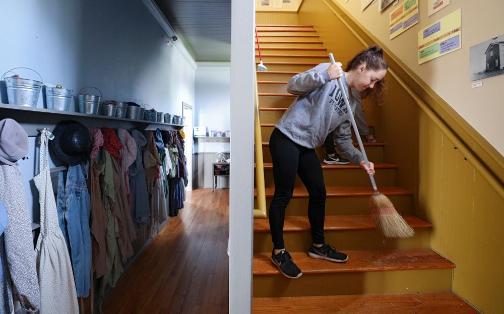 Iowa women's gymnasts clean the 1876 Coralville Schoolhouse during the 21st annual ISAAC Hawkeye Day of Caring in Coralville on Sunday, Apr. 28, 2019. (Stephen Mally/hawkeyesports.com)