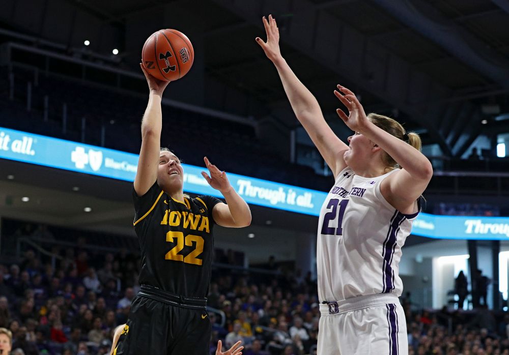 Iowa Hawkeyes guard Kathleen Doyle (22) makes a basket during the first quarter of their game at Welsh-Ryan Arena in Evanston, Ill. on Sunday, January 5, 2020. (Stephen Mally/hawkeyesports.com)