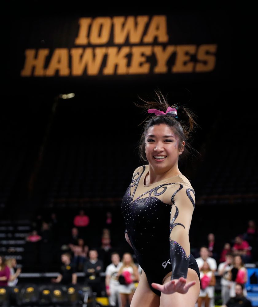 Iowa's Nicole Chow competes on the floor 
