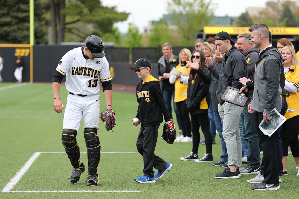 Garret Nichols throws out a first pitch before the Iowa Hawkeyes game against Michigan State Sunday, May 12, 2019 at Duane Banks Field. (Brian Ray/hawkeyesports.com)