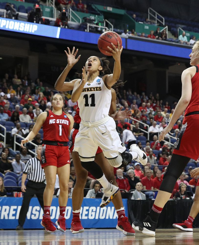 Iowa Hawkeyes guard Tania Davis (11) against the NC State Wolfpack in the regional semi-final of the 2019 NCAA Women's College Basketball Tournament Saturday, March 30, 2019 at Greensboro Coliseum in Greensboro, NC.(Brian Ray/hawkeyesports.com)