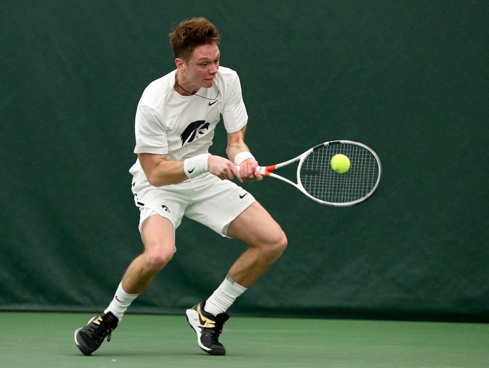 Iowa’s Jason Kerst returns a shot during his singles match at the Hawkeye Tennis and Recreation Complex in Iowa City on Sunday, February 16, 2020. (Stephen Mally/hawkeyesports.com)