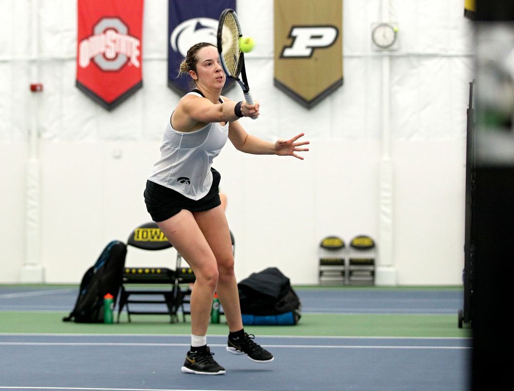 Iowa’s Samantha Mannix returns a shot during her doubles match at the Hawkeye Tennis and Recreation Complex in Iowa City on Sunday, February 23, 2020. (Stephen Mally/hawkeyesports.com)
