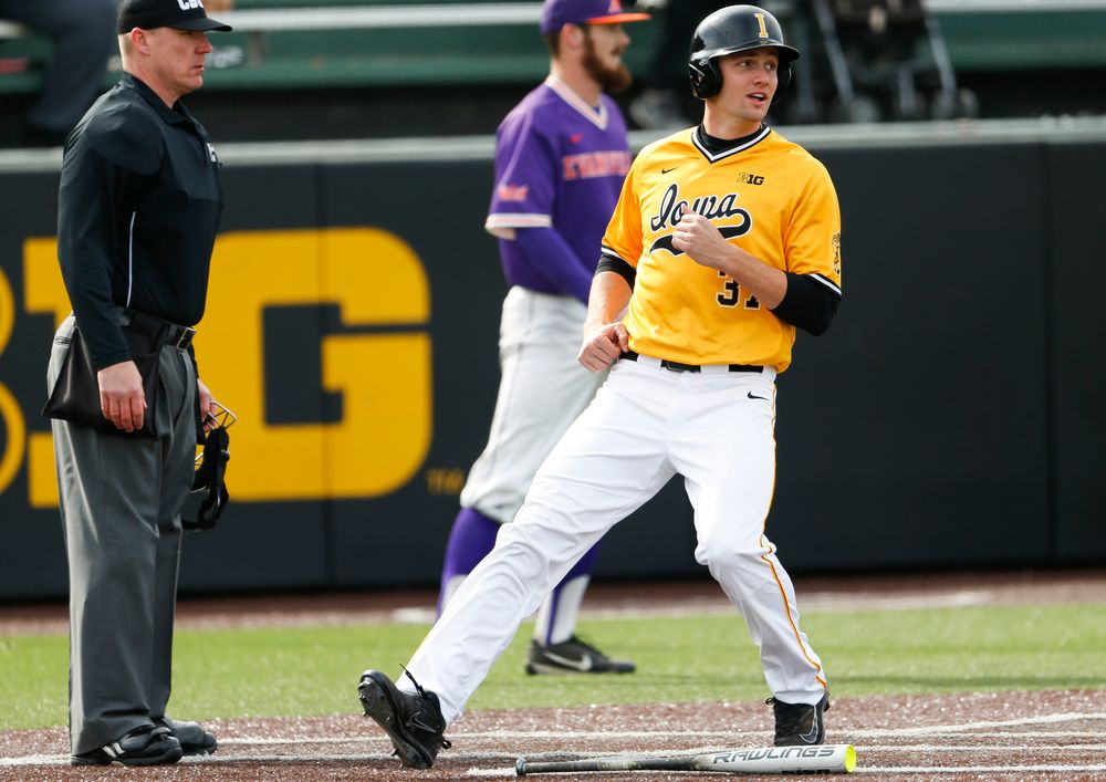 Iowa Hawkeyes outfielder Kace Massner (37) scores the go-ahead run in the eighth inning during a game against Evansville at Duane Banks Field on March 18, 2018. (Tork Mason/hawkeyesports.com)