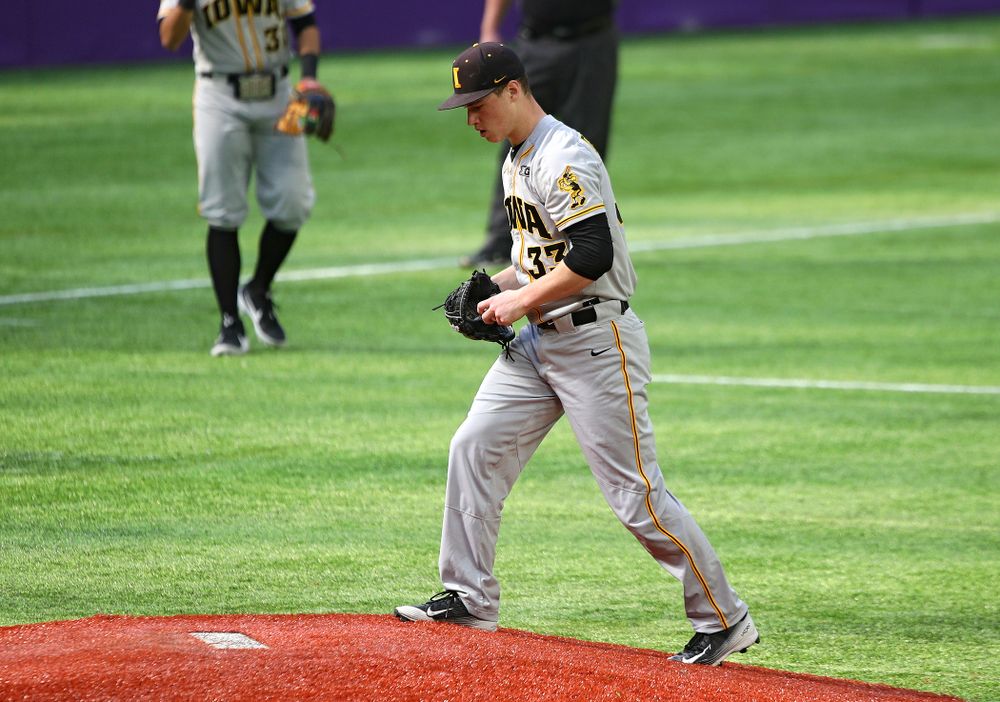 Iowa Hawkeyes pitcher Jack Dreyer (33) walks up the mound during the fourth inning of their CambriaCollegeClassic game at U.S. Bank Stadium in Minneapolis, Minn. on Friday, February 28, 2020. (Stephen Mally/hawkeyesports.com)