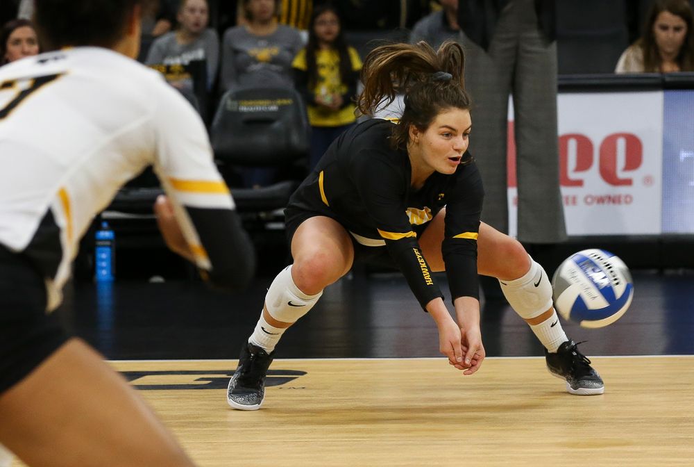 Iowa Hawkeyes defensive specialist Molly Kelly (1) digs the ball during a game against Purdue at Carver-Hawkeye Arena on October 13, 2018. (Tork Mason/hawkeyesports.com)