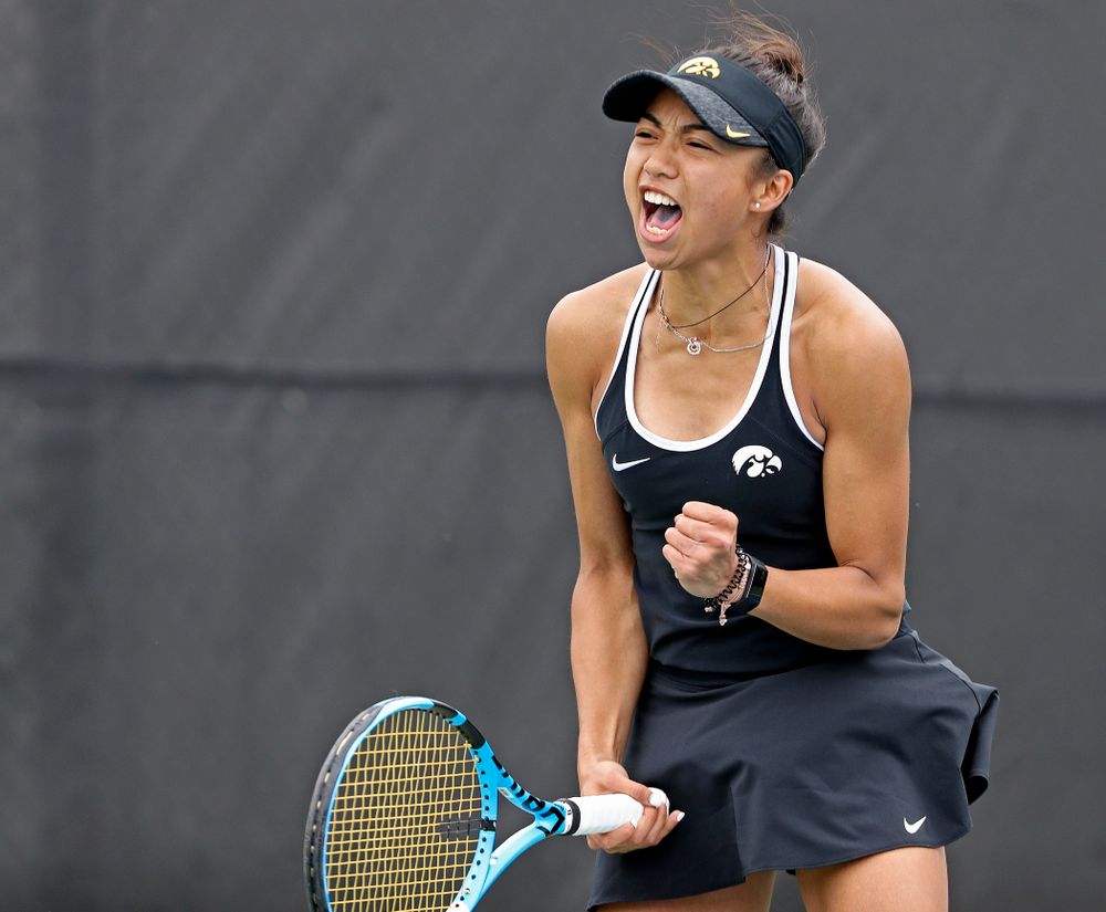 Iowa's Michelle Bacalla celebrates after winning her match against Rutgers at the Hawkeye Tennis and Recreation Complex in Iowa City on Friday, Apr. 5, 2019. (Stephen Mally/hawkeyesports.com)