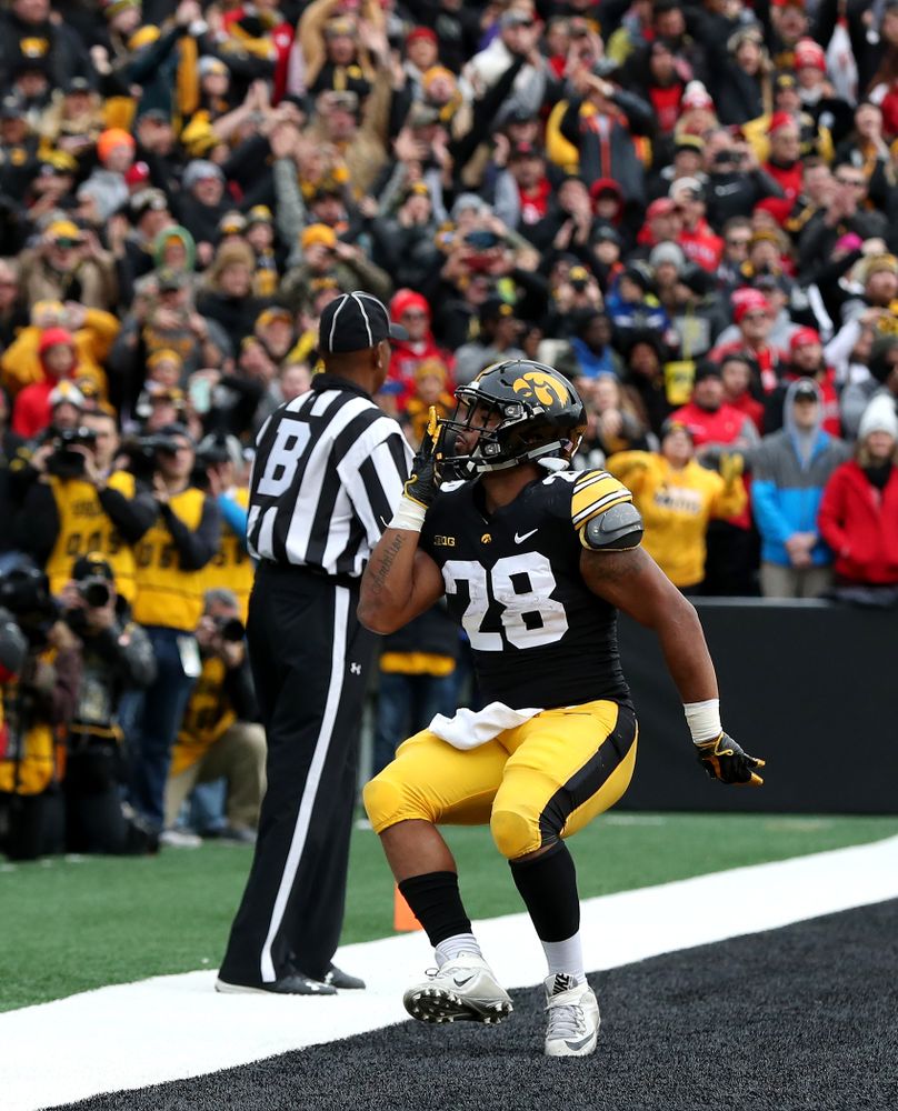Iowa Hawkeyes running back Toren Young (28) blows a kiss to the fans after scoring against the Nebraska Cornhuskers Friday, November 23, 2018 at Kinnick Stadium. (Brian Ray/hawkeyesports.com)