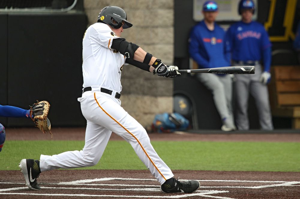 Iowa first baseman Peyton Williams (45) hits a double during the first inning of their college baseball game at Duane Banks Field in Iowa City on Wednesday, March 11, 2020. (Stephen Mally/hawkeyesports.com)