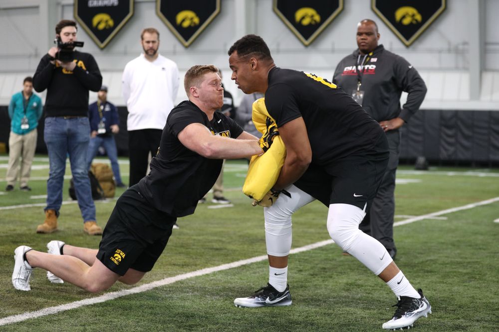 Iowa Hawkeyes defensive end Parker Hesse (40) and tight end Noah Fant (87) during the teamÕs annual Pro Day Monday, March 25, 2019 at the Hansen Football Performance Center. (Brian Ray/hawkeyesports.com)