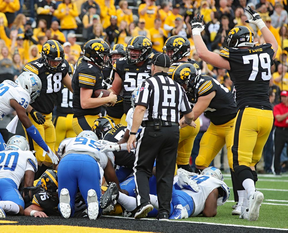 Iowa Hawkeyes quarterback Spencer Petras (7) celebrates after scoring a touchdown on a 1-yard run during fourth quarter of their game at Kinnick Stadium in Iowa City on Saturday, Sep 28, 2019. (Stephen Mally/hawkeyesports.com)