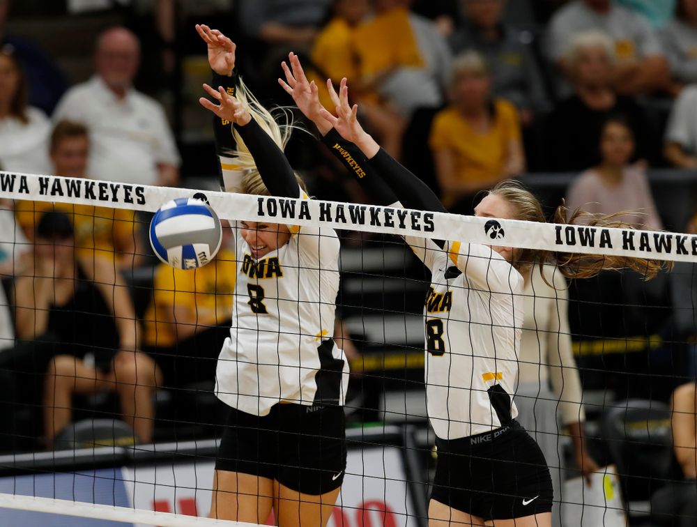 Iowa Hawkeyes middle blocker Hannah Clayton (18) and right side hitter Reghan Coyle (8) against Eastern Illinois Sunday, September 9, 2018 at Carver-Hawkeye Arena. (Brian Ray/hawkeyesports.com)