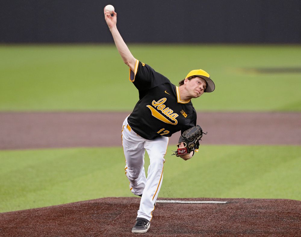 Iowa Hawkeyes pitcher Drew Irvine (12) delivers to the plate during the fourth inning of their game against Illinois State at Duane Banks Field in Iowa City on Wednesday, Apr. 3, 2019. (Stephen Mally/hawkeyesports.com)